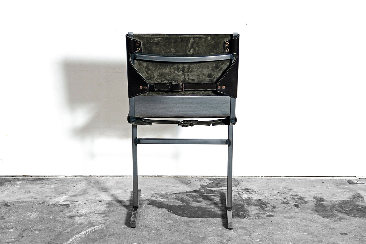 green_memento_back handmade artisan interior interiordesign design sober craftsmanship raw materials interiorstyling contemporary inspiration designer creative minimal minimalism wdstck amsterdam architecture architects art collective atelier Memento leather buckles scars skin simplicity steel frame pure chair barstool ecological tanning seating object jesse sanderson
