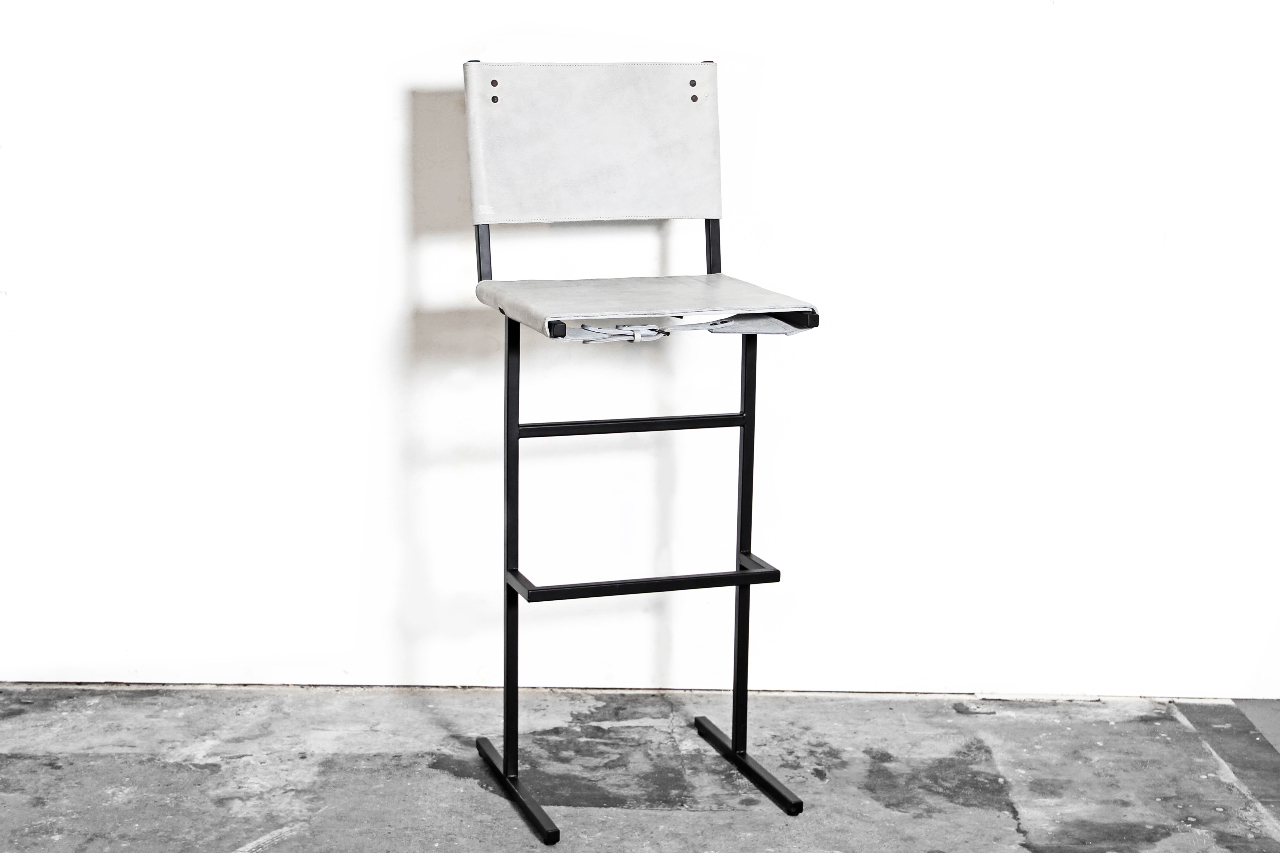 handmade artisan interior interiordesign design sober craftsmanship raw materials interiorstyling contemporary inspiration designer creative minimal minimalism wdstck amsterdam architecture architects art collective atelier Memento leather buckles scars skin simplicity steel frame pure chair barstool ecological tanning seating object jesse sanderson
